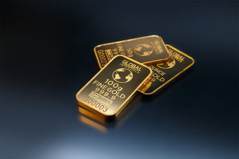 Gold bars stacked with rising price graph – symbolizing gold price rise of ₹600 per 10 gram in India